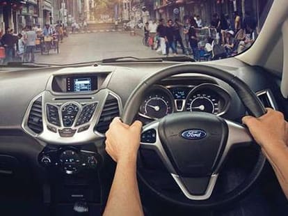 A man car driving without hand