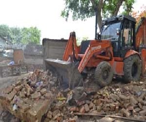 Bulldozers destroyed a dozen houses