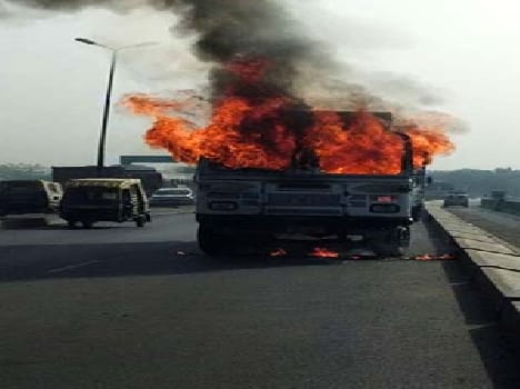 New bridge in flames lit by flames truck