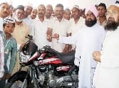 Chairman of the Imam Presented to the bike