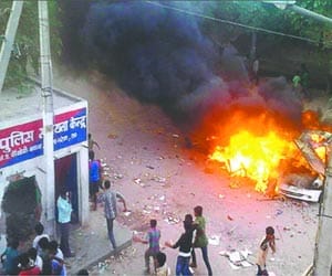 because of killed child ruckus, including the police station burnt in vehicle