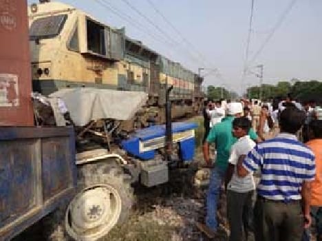 Goods train collided with a tractor , traffic disrupted