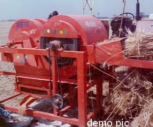 woman severely injured in a Threshing Machine