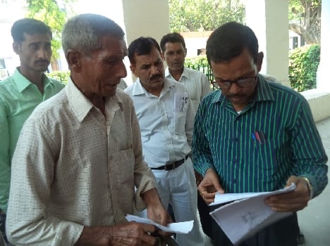 Denied compensation of land farmers furore