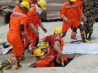 nepal says go back to Aid workers