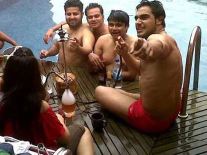 Photograph oh SP leader in swimming pool with girl gets viral