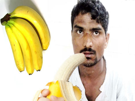 Thief being fed bananas to expel 25-gm gold necklace