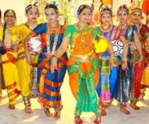 dance with football in football tournament.
