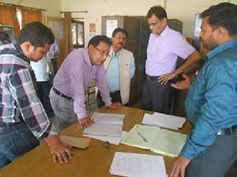 Savings officials , including 14 officers , cut salaries
