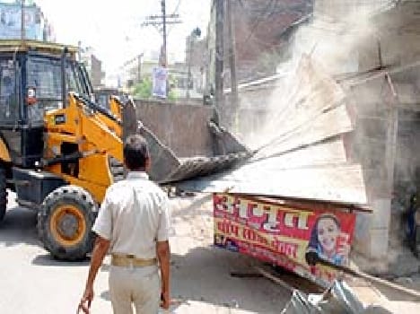 In large part , bulldozers roared across tracks
