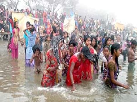 Profit earned dip in the holy Ganges