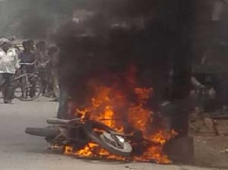 Dhukr flames burning cars and bikes