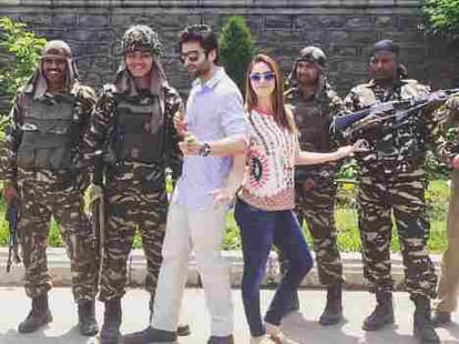 actress lauren gottlieb courts controversy for posing with AK47