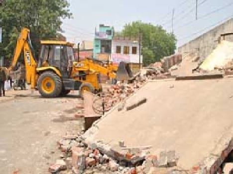 Accessible toilets , bulldozers moved on