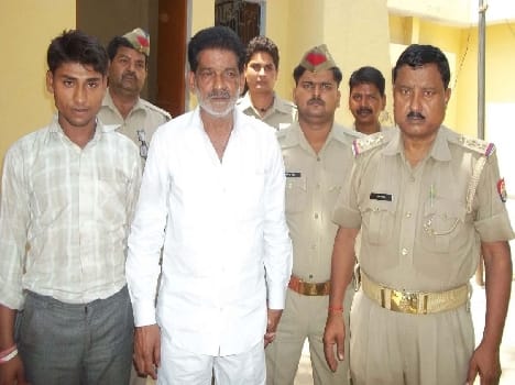 East block chief and his driver were caught tot