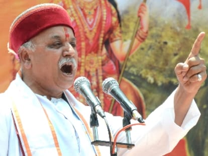 vhp parveen togdia slams pm modi for manipur attack.