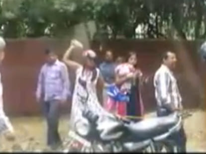 head constable attacked by stone on woman