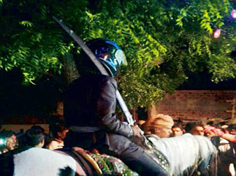 when groom with helmet while own weding