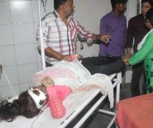 A girl get down from fifth floor of a building.