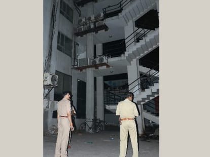 A girl get down from fifth floor of a building.