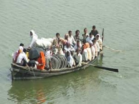Overloaded boat with passengers