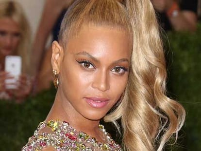 beyonce posed in her glamorous sheer Met Gala gown 