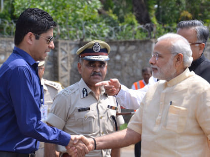 collector recived modi by wear dark glasses,  