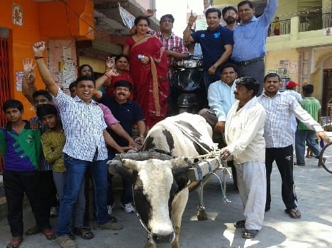 Opposition expressed bike loaded on bullock carts