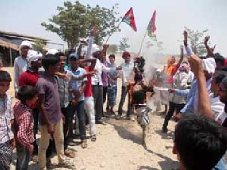 Blew the effigy of  Prime Minister  