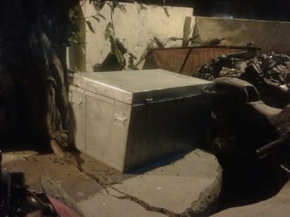 Woman's dead body found in a box.