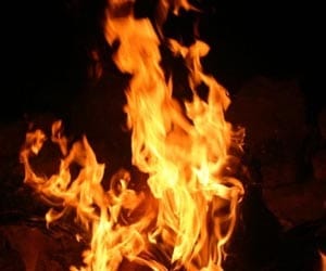 fire on car in jammu, three injured
