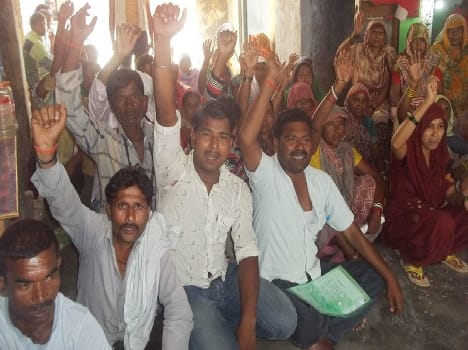 Sanitation workers protesting the display of