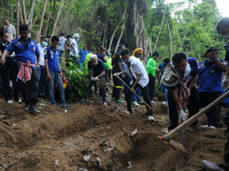 Mass graves found in Malaysia