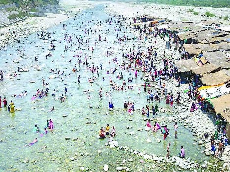 Devotees surge