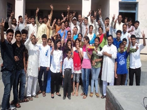 Almora district banner waved by students