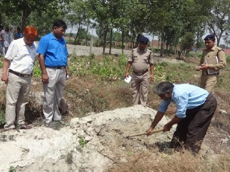 Grave exhumed the bodies buried a year ago