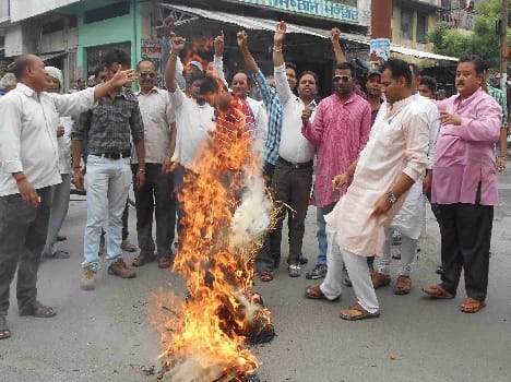 Performing blew government effigy