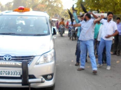 Health minister shown black flags