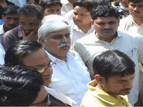 Former minister and son of muscle in court