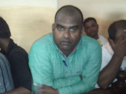 Wife killer policeman beaten in court
