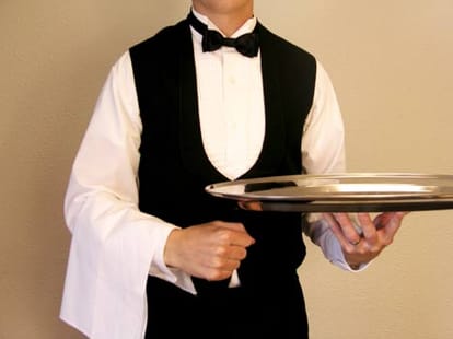 Waiter pleads guilty to spitting in customer's drink