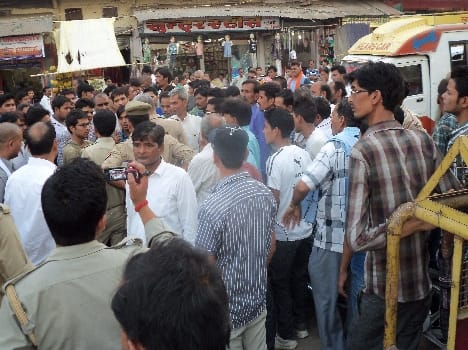 The crowd round the police station gherry