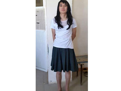 boyfriend dresses as his girlfriend so that he can take her exam