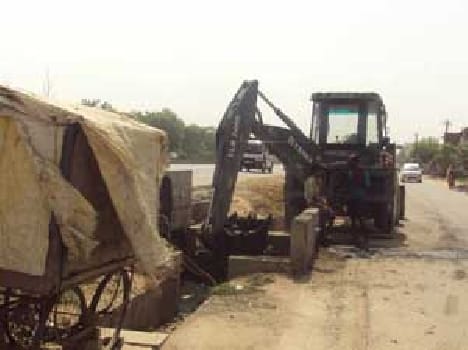 sewer cleaning with JCB 