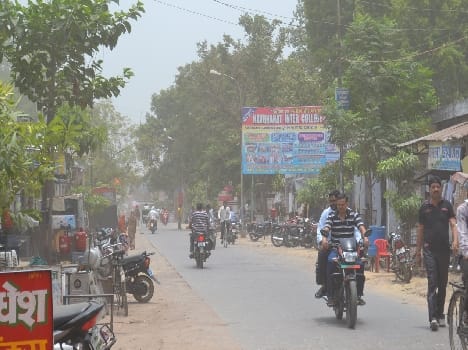 Partly cloudy skies , hot sun relief