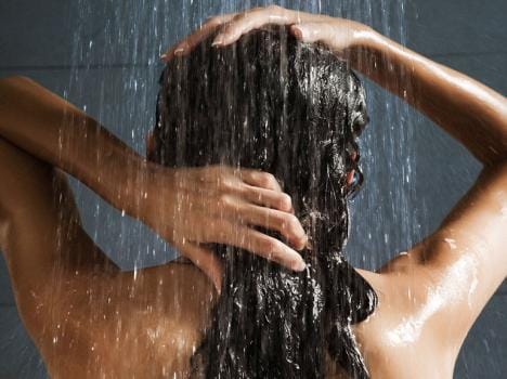 The woman was taking a bath in the bathroom, landlord entered. 