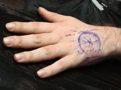 russian engineer implanted card in his hand