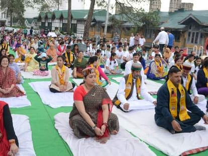Lk advani and smriri irani in himachal for yoga day.