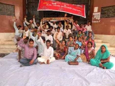 teachers protest against Management at DM office on monday.