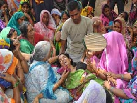 Woman killed after being crushed by tractor